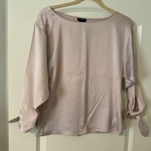 Silky light pink blouse with tie sleeves